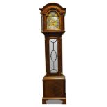A mahogany longcase clock, early 20th Century, the break arch hood with brass capped columns, the