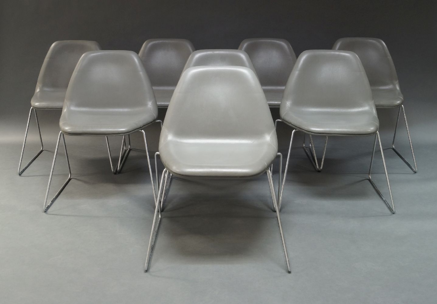 A set of 8 'Ruby' Chairs by Montis, of recent manufacture, with grey leather upholstered seats, on