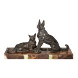 An Art Deco Cold-painted spelter 'Alsatian' Groupc.1930, apparently unsignedCast as a pair of