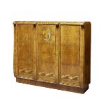 Paul Follot (1877-1941) Attributed, an Art Deco burr walnut and marquetry bedroom suite inlaid