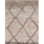 A Moroccan handwoven long pile wool rugSecond quarter 20th CenturyWoven with a lozenge pattern,