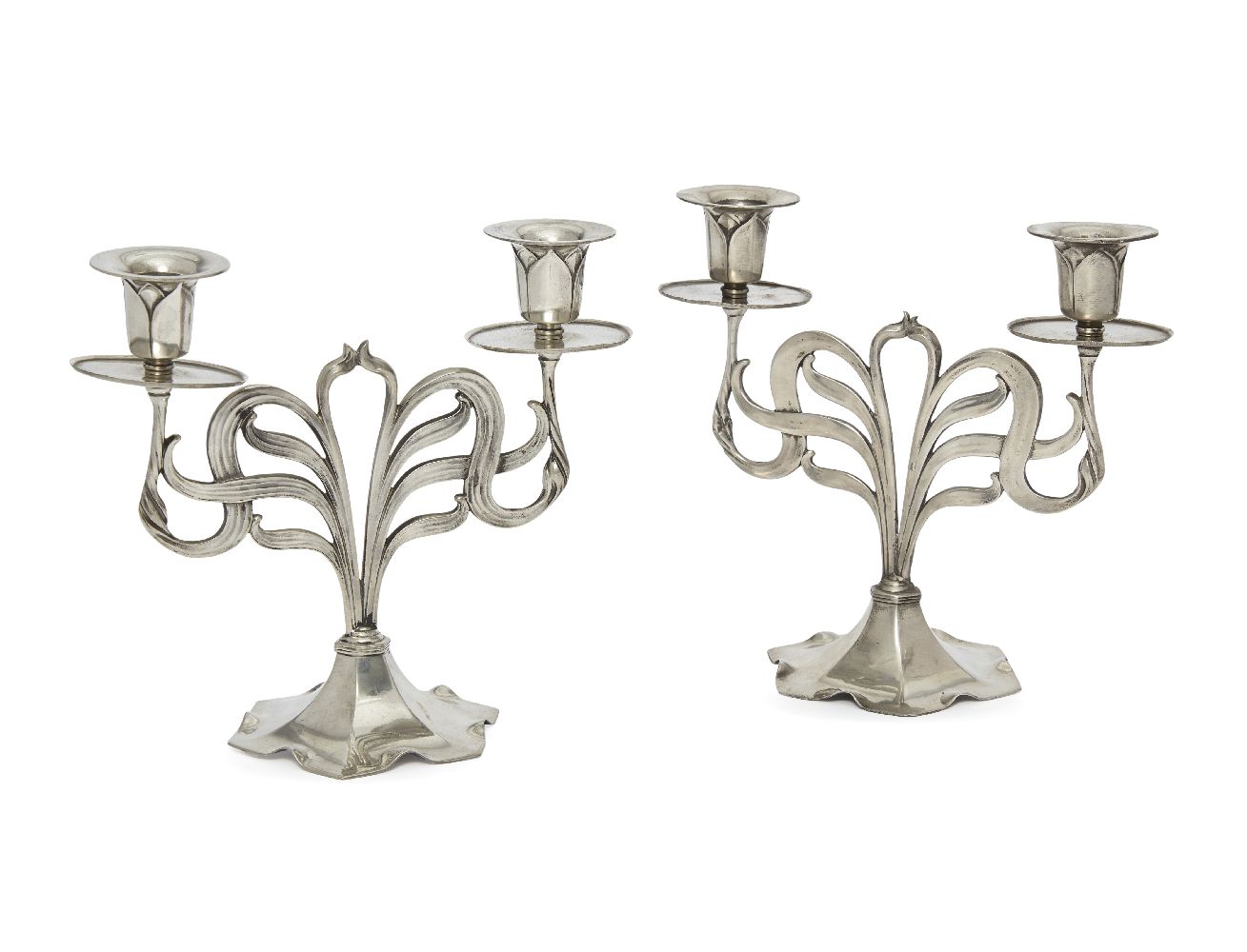 Orivit, a pair of German Art Nouveau polished pewter twin-branch candelabraEarly 20th Century,