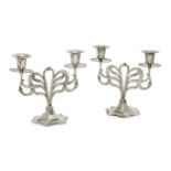 Orivit, a pair of German Art Nouveau polished pewter twin-branch candelabraEarly 20th Century,