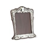 E. Mander & Son, an Art Nouveau silver and mahogany photograph frameMark of E. Mander & Son,