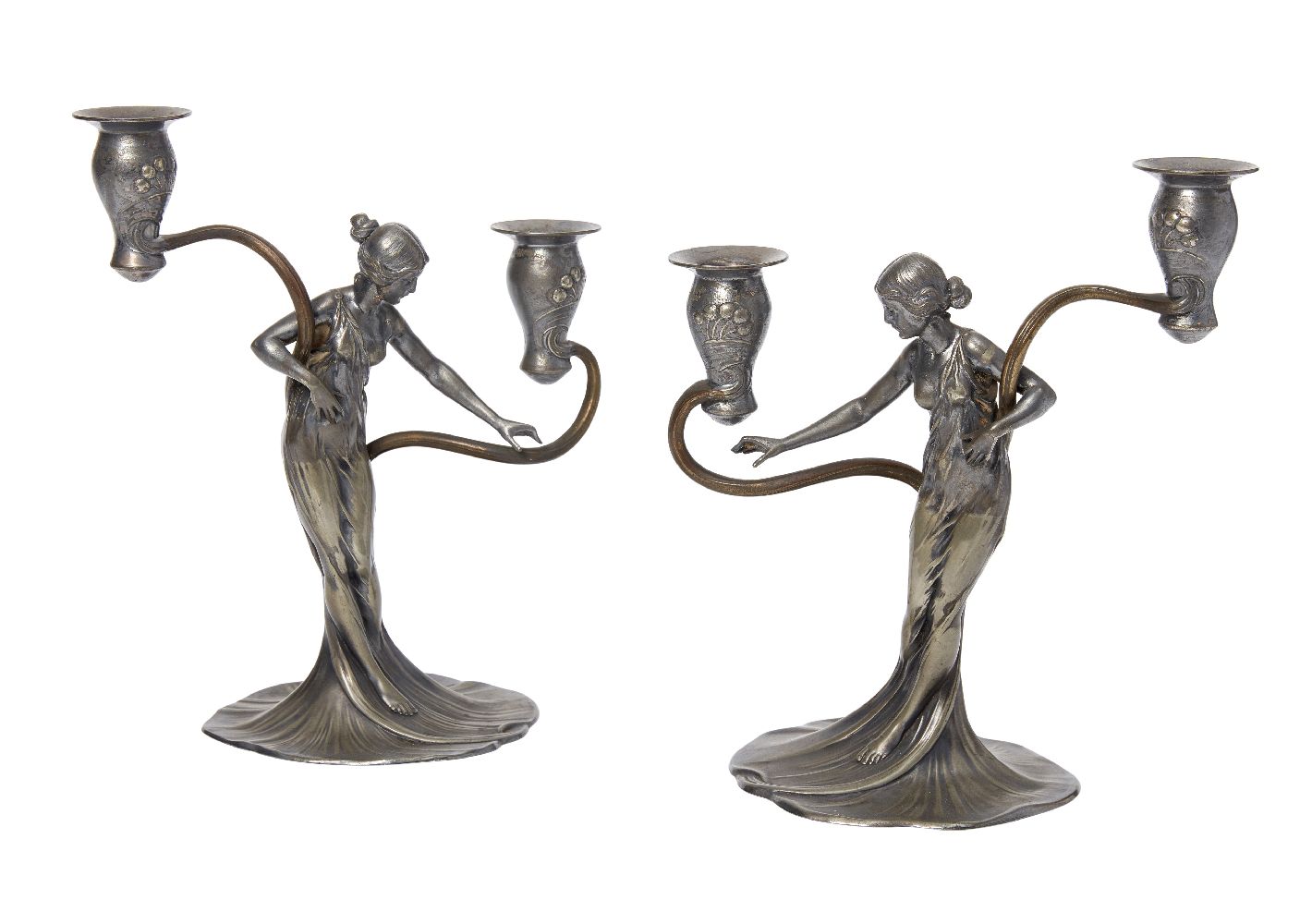 WMF, a pair of Art Nouveau pewter and brass figural candelabrac.1906, faint stamped maker's marks,