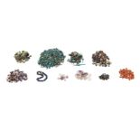 A large group of amethyst and carnelian beads, turquoise faience beads, mosaic glass beads and