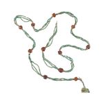 An Egyptian mummy bead necklace, composed of glazed composition cylindrical and disc mummy beads and