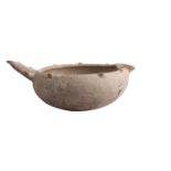 An Amlash handled pottery bowl, circa early 1st millenium BC, of deep form, with protrusions to