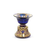 A small gilded blue glass spittoon, India 18th/19th century, of waisted form, the gilt decorated