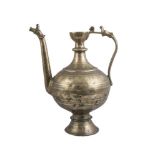 An inlaid Mughal brass ewer, India, 17th century, of globular form, on a high tiered spreading foot,