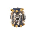 An 'Eye' Bead, Phoenician, 7th-6th century BC, of tubular form, with yellow and white smaller