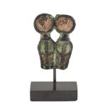 An Egyptian bronze double uraei with enamelling Late Dynastic Period, circa 664-30 BC, 3cm.