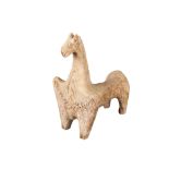 A pottery model of a horse, Amlash-style, with elongated neck and stylised mane, on four legs,