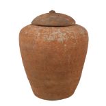 A Chinese terracotta lidded jar with Sanskrit inscriptions, Han dynasty, Hunan province, 20cm high
