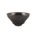 A Chinese yuteki tenmoku 'oil spot' tea bowl, Jian kilns, Fujian province, Song dynasty, the deep