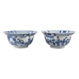 A pair of Chinese porcelain bowls, Xuande mark, Kangxi period, each painted in underglaze blue