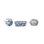 Three Chinese porcelain bird feeders, Qing dynasty, 18th century, each painted in underglaze blue,
