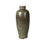 A Chinese Longquan grey stoneware celadon glazed vase, Ming dynasty, 16th century, of ovoid form,