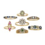 A group of seven diamond & gem rings: comprising: an old-mine-cut diamond and cushion-shaped navette