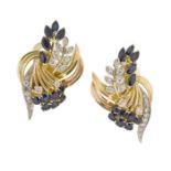 A pair of sapphire and diamond earrings, of foliate spray design, composed of navette-cut sapphire