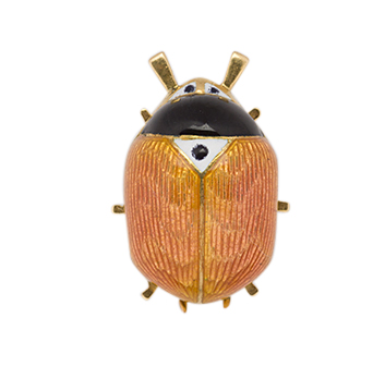 A gold and enamel ladybird clip brooch, the body with pink guilloche enamel back and black and white