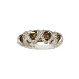 A diamond and coloured diamond ring, of half-hoop design set with pave brown diamonds with a