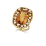 An 18ct gold, citrine and cultured pearl ring, the single elongated cushion shaped mixed-cut citrine