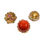 Three gem rings, comprising, a coral, corallium rubrum, large bead single stone ring in texured