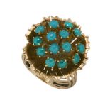 A turquoise cluster ring, of flowerhead design, to a reeded hoop, ring size PRefer to department