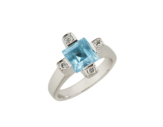 An 18ct gold, blue topaz and diamond ring, the single square-cut blue topaz with square-set