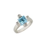 An 18ct gold, blue topaz and diamond ring, the single square-cut blue topaz with square-set