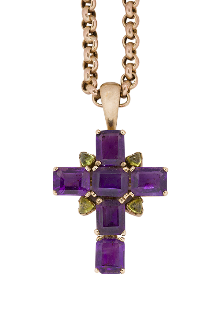 A 9ct. gold mounted amethyst cross pendant, composed rectangular-cut amethysts with cabochon peridot