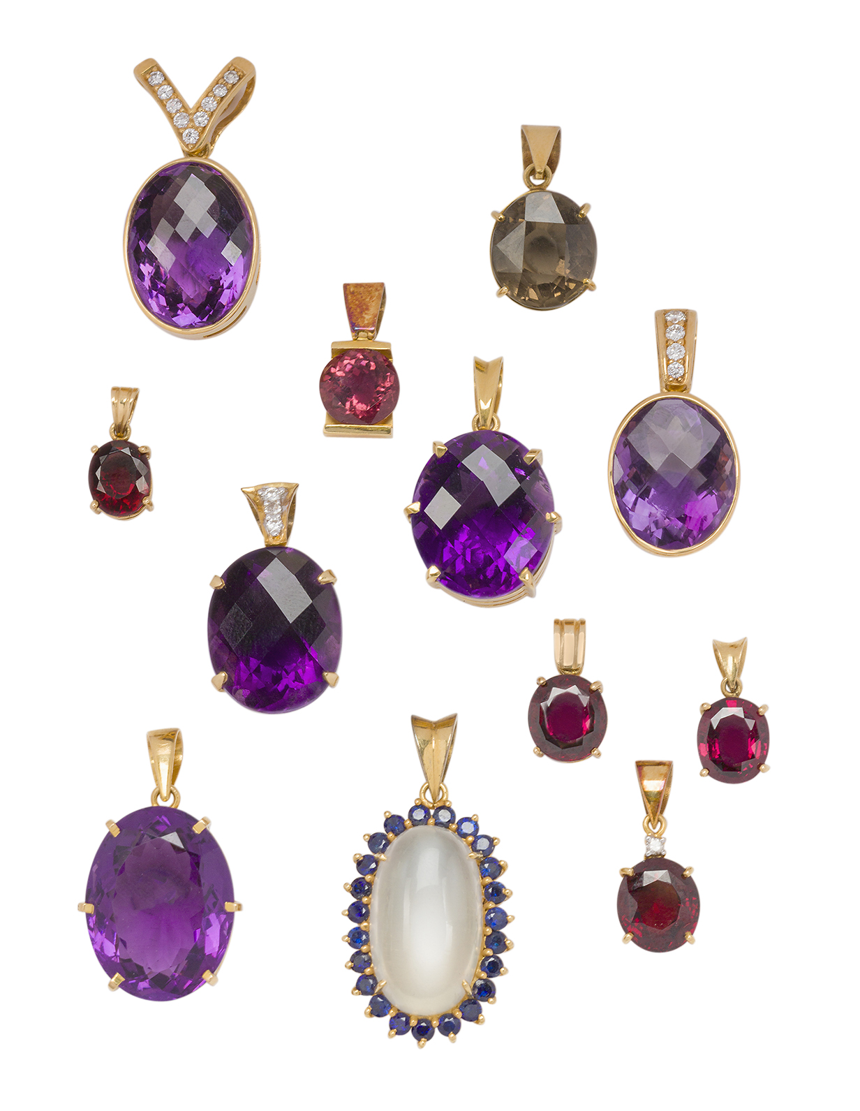 A group of five amethyst pendants, 6 gem pendants, and a moonstone and sapphire pendant, amethyst