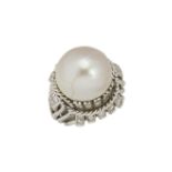 A mabe cultured pearl and diamond ring, of bomb cluster design, The single mabe cultured pearl