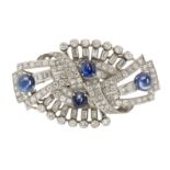 An Art Deco sapphire and diamond double clip brooch, the oval double clip of openwork geometric