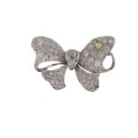 A diamond bow brooch, the ribbon bow with pave old-brilliant-cut diamonds and diamond two stone