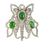 A Jadeite jade and diamond clip brooch, modelled as a stylised butterfly set with three cabochon