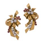 A pair of gold, 1940s diamond and ruby earclips, each of ribbon bow cluster design, set with old-