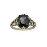 An early 20th century, natural purple spinel ring, the single cushion-shaped purplish spinel in