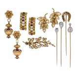 A group of jewellery, comprising two diamond stickpins one set with a single kite-shaped diamond