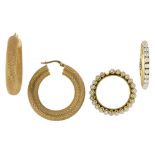 A pair of earrings and a pair of cultured pearl rings, the earrings of textured hollow tubular