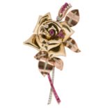 An impressive 1940s, two colour gold, diamond and ruby, rose spray brooch, the central flower claw-