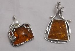 Two silver pendants