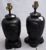 A pair of bronze dog-of-fo lamps