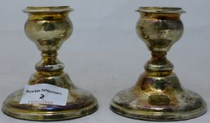 A pair of silver candlesticks