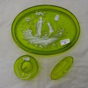 A Mary Gregory decorated green glass dressing table tray,