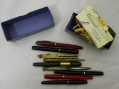 A quantity of vintage fountain pens, etc,