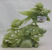 A jade carved model of a bird