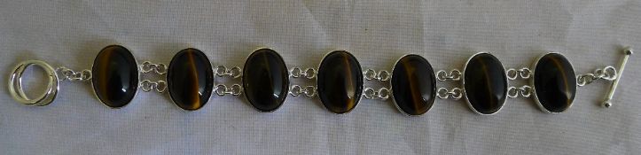 A silver and tigers eye bracelet