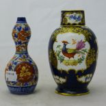 A Worcester type hand painted porcelain caddy and cover and an Imari double gourd vase